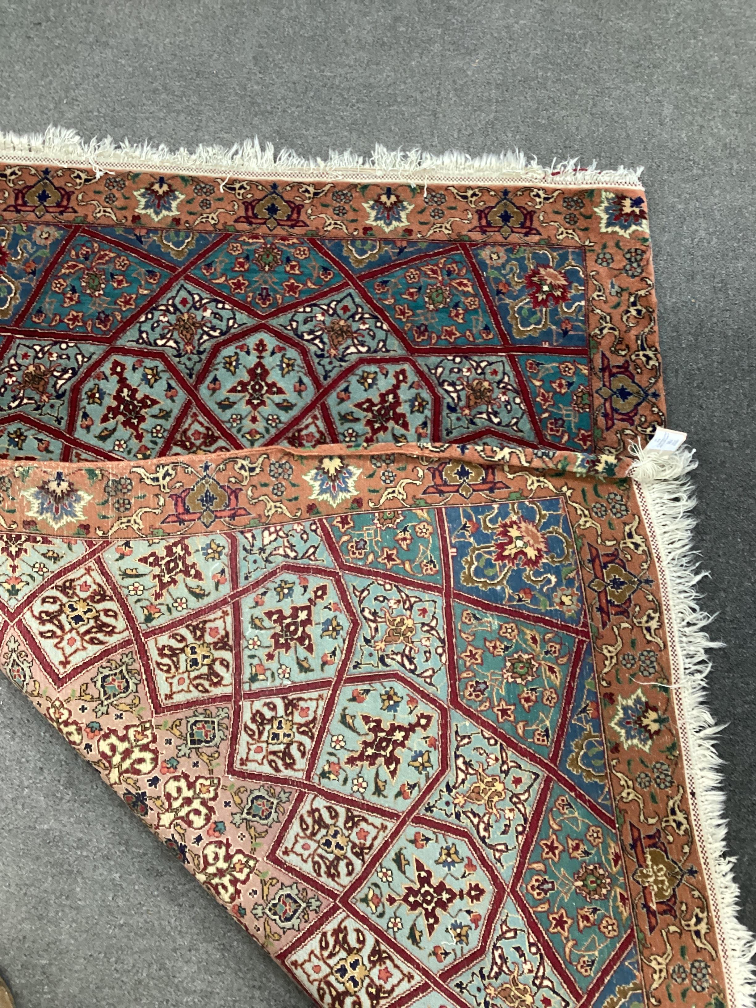 A North West Persian peach ground rug, 140 x 100cm